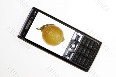 Mobile phone with lemon on screen