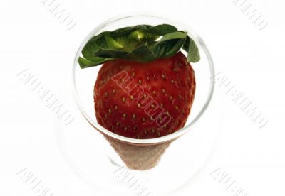 Strawberry in glass and ice