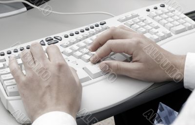 typing on computer keyboard