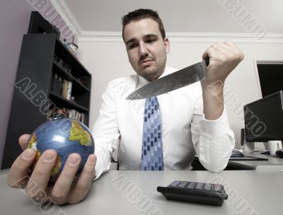 Businessman holding globe