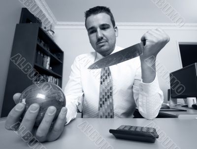 Businessman holding globe