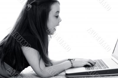 Young girl in front of a laptop