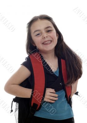 Happy young girl ready for school