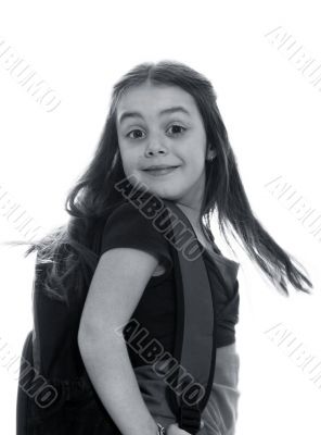 Happy young girl ready for school