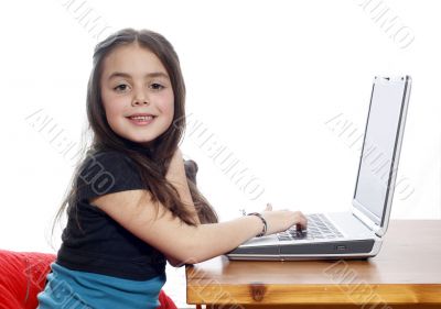 Young girl in front of a laptop