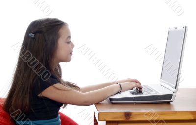 Young girl in front of a laptop