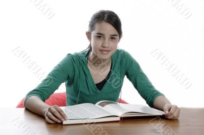 young woman reading in the library