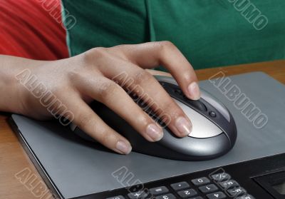  Girls hand on computer mouse