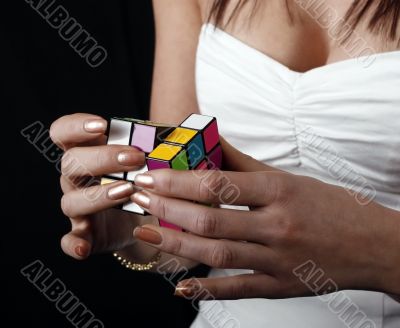 girl solving rubik cube