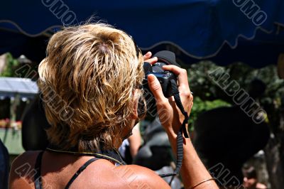 Blond photographer woman