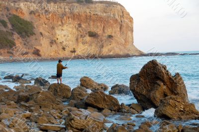 Fishing on a Rocky Beach