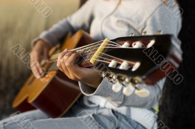 Playing guitar