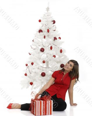 Happy woman with Chirstmas gifts