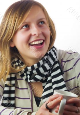 Girl drinking coffee and smiling