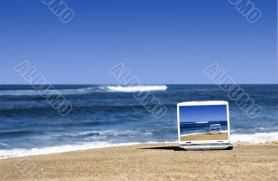 Laptop on the beach