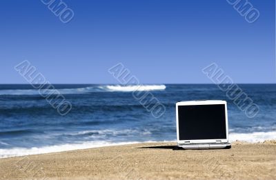 Laptop on the beach