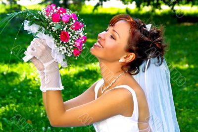 Bride with the bunch of flowers