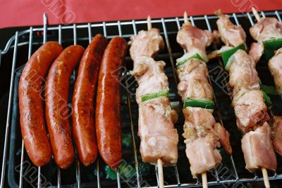 Sausages and kebab on Barbecue BBQ grill