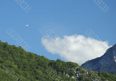 A glider flying over Alps