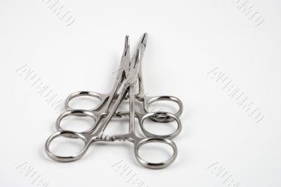 Hemostats and clamps