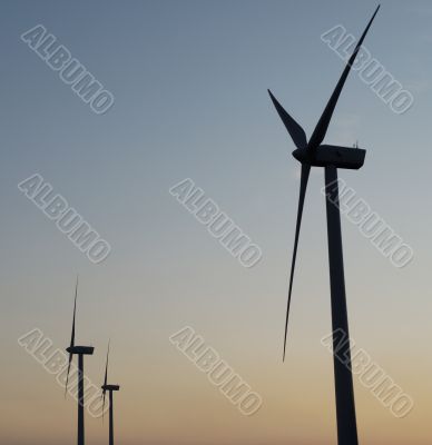 windturbines on sunset sky