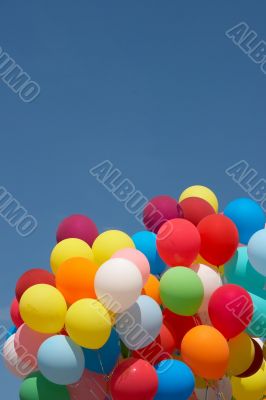 Countless colorful balloons in deep blue sky