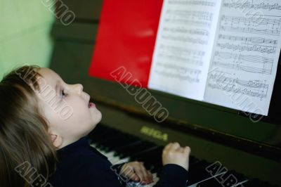 girl by the piano