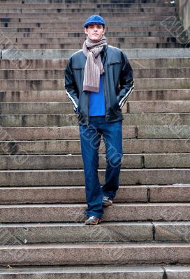 Handsome man walking stairs