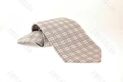 grey tie on a white background