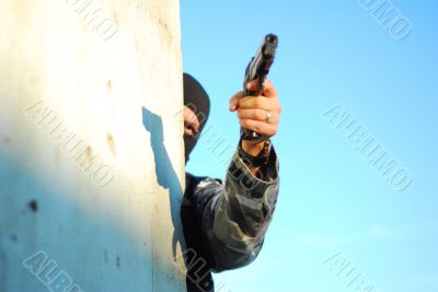 terrorist with mask and gun