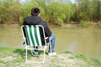 man sitting in the chair