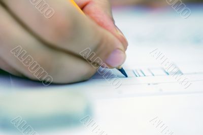 hand with pencil