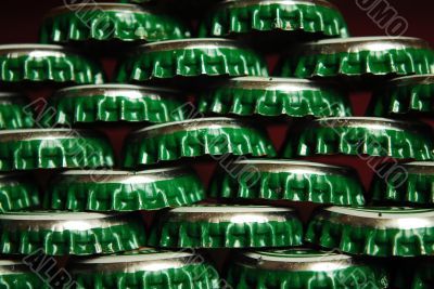 pile of green beer caps