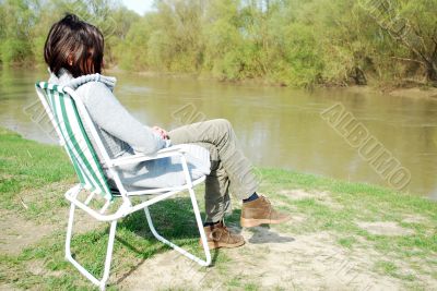 woman sitting in the chair