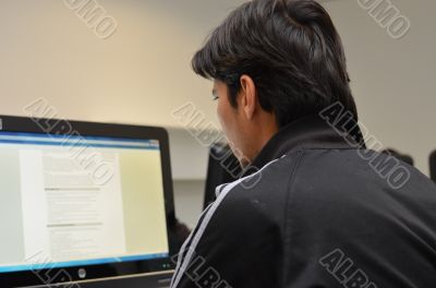 Adult male at work on computer