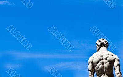 Statue on blue sky