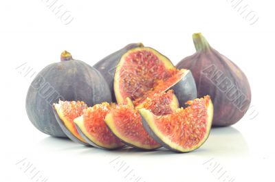 slices of fig on a white background