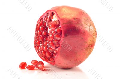 Red pomegranate on a white background