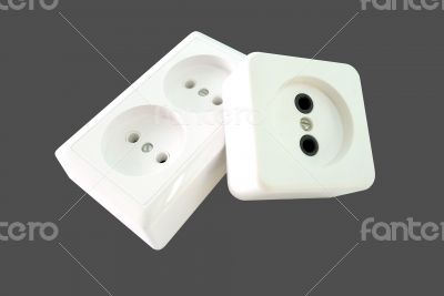 Electrical sockets on a grey background