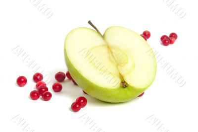 Half of a green apple with red bilberrie