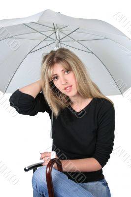 Beauty blonde girl with an umbrella