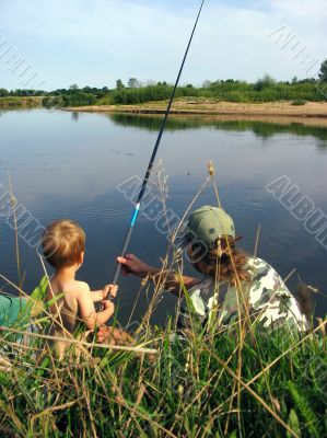 Father and son fishing together