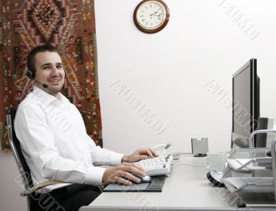  friendly telephone operator in an office