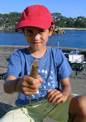 boy catches a fish