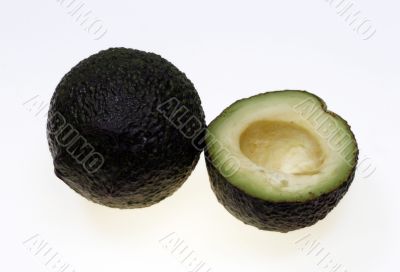  Avocado. Two halfs on white background