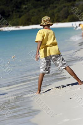 playing at the whitehaven beach