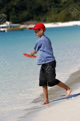 playing at the whitehaven beach