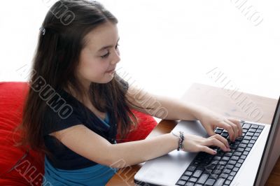 Young girl in front of a laptop