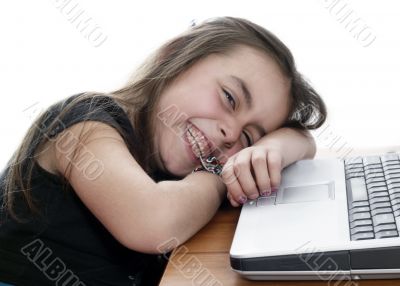 Young girl in front of a laptop