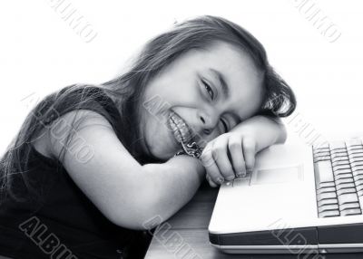 Young girl in front of a laptop